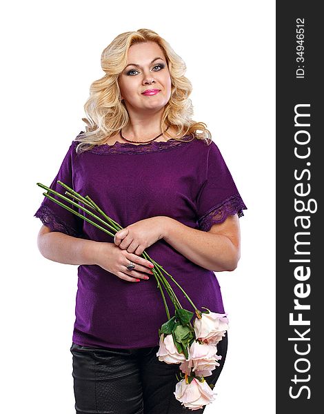 Blonde lady with a bouquet of flowers in her blouse shot in studio