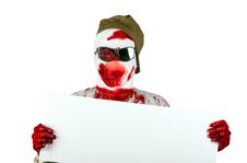 Scary Bloody Zombie Wearing A Cap And Glasses Stock Photography