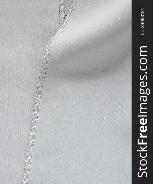 Grey fabric with seam