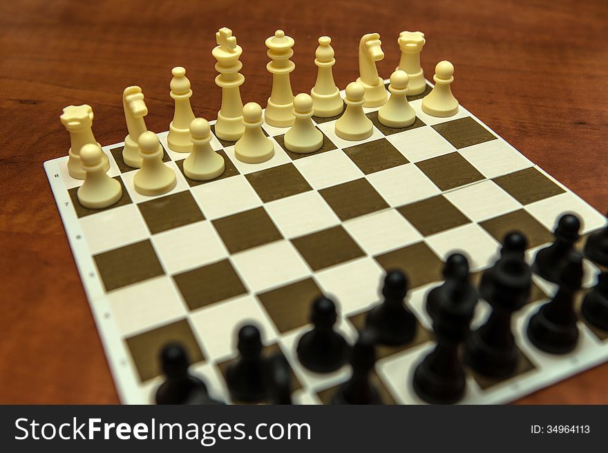 Bunch of chess on the bed sheet