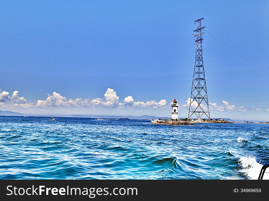 The sea beacon costs in the middle of the sea as a sign for the ships