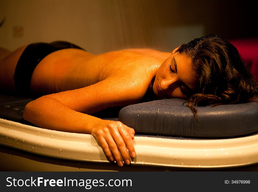 Relaxed woman lying in a spa. Relaxed woman lying in a spa.