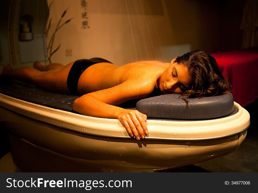 Lying Relaxed Woman During Spa Treatment.