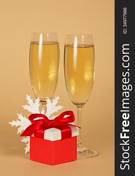 Wine Glasses With Champagne, A Red Gift Box