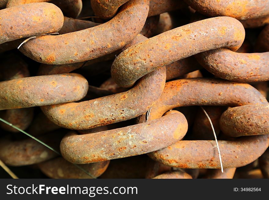 Rusted steel chains as a background. Rusted steel chains as a background