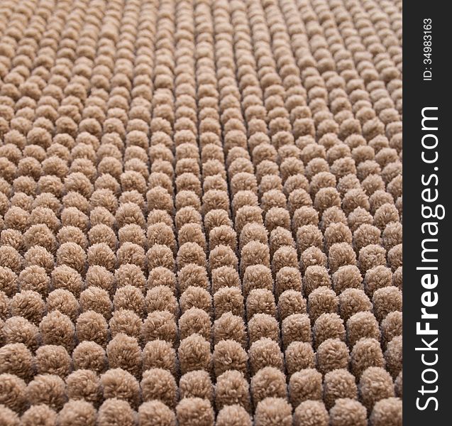 A beautifully detailed image of a pure beige carpet.