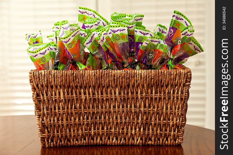 Pretty basket filled with Halloween candy bags