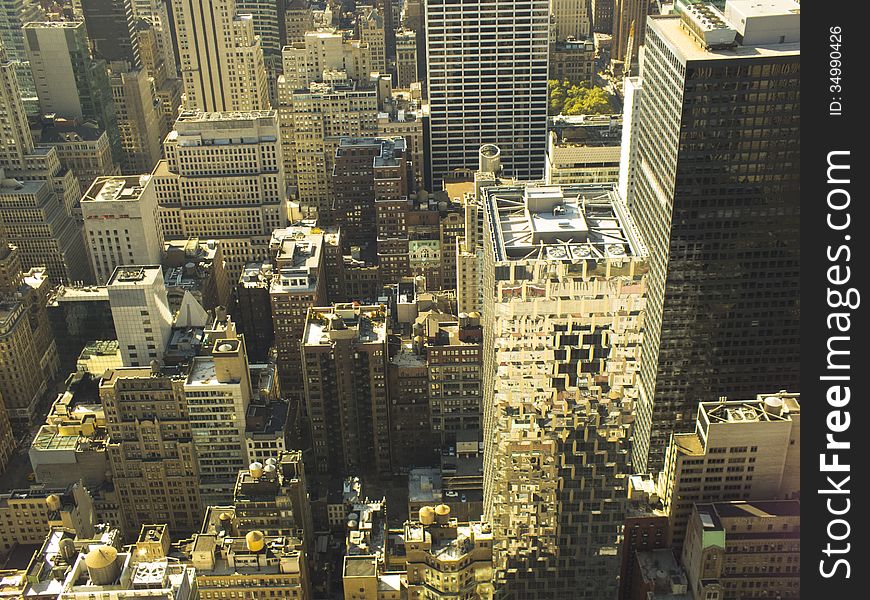 A top view of office building and skyscrapers in New York City. A top view of office building and skyscrapers in New York City