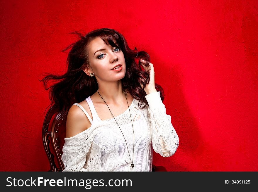 Beautiful girl on red background horizontal