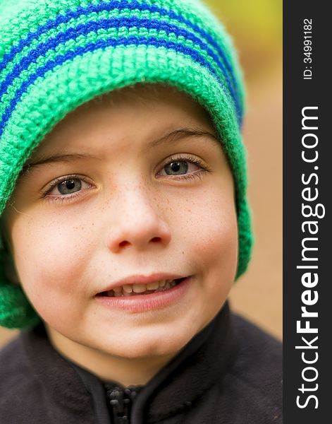 Portriat of a kid wearing a knit cap. Portriat of a kid wearing a knit cap