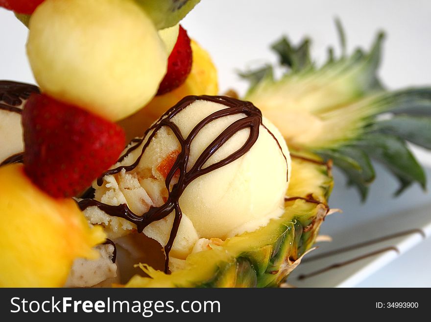 Ice cream with fruits in pineapple