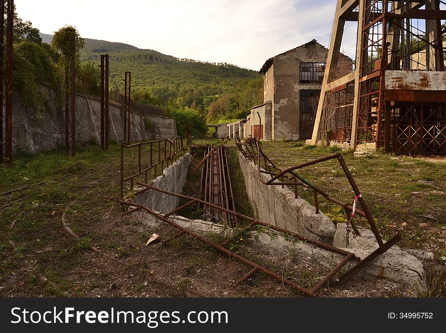 Sty ruabandoned industrial machinery in mountains landscape. Sty ruabandoned industrial machinery in mountains landscape