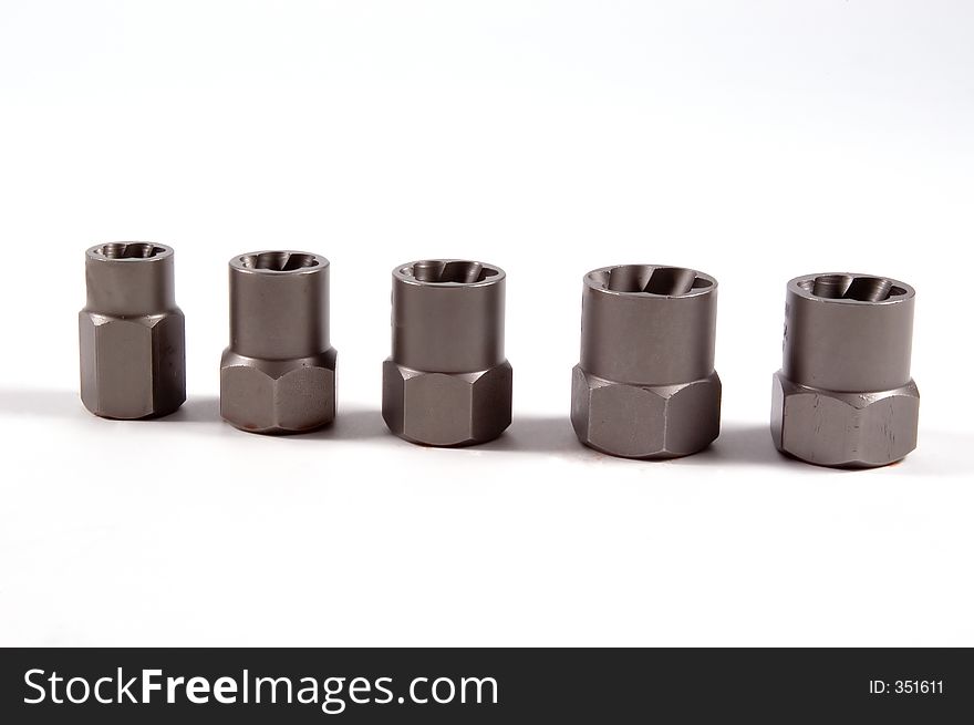 A set of bolt extractors for removing stipped nuts from bolts. A set of bolt extractors for removing stipped nuts from bolts