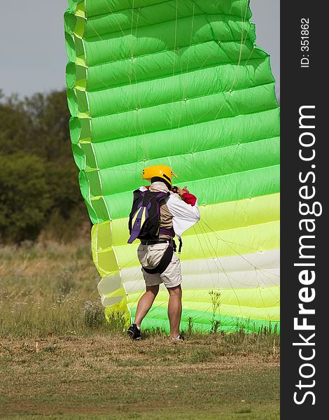 At end of skydive with green parachute