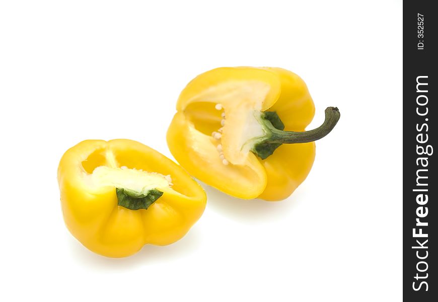 Yellow bulgarian pepper over the white. Yellow bulgarian pepper over the white