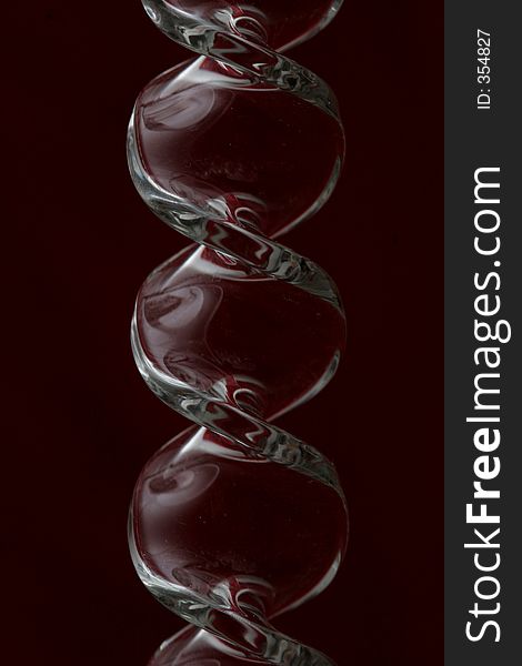 A deep burgundy red glass ornanment (reflections of the color)