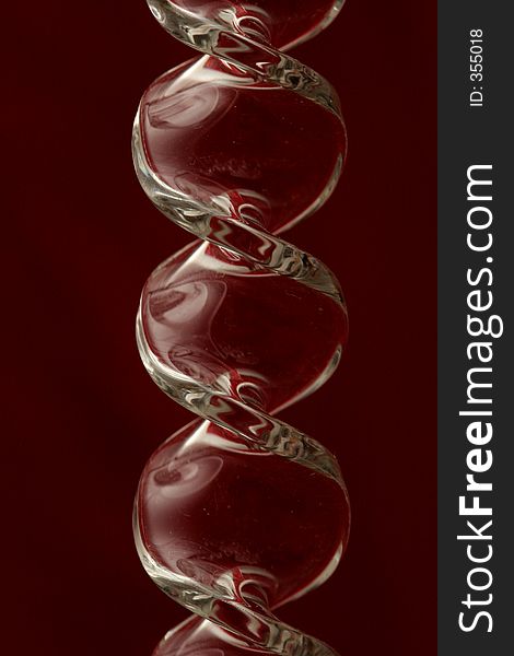 Deep burgundy background reflecting in glass. Deep burgundy background reflecting in glass