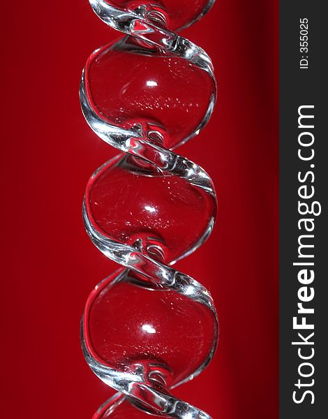 Macro of a glass ornament with red background. Macro of a glass ornament with red background