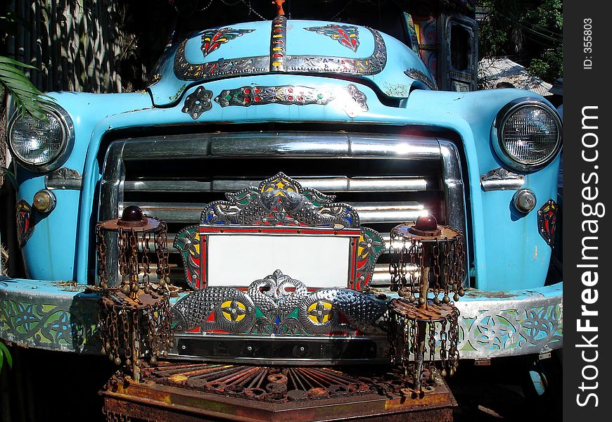 Embellished blue truck radiator and headlights