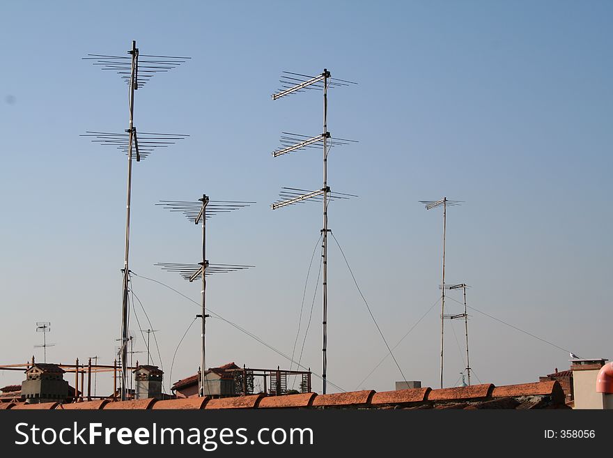 Antennas over Ventian roofs