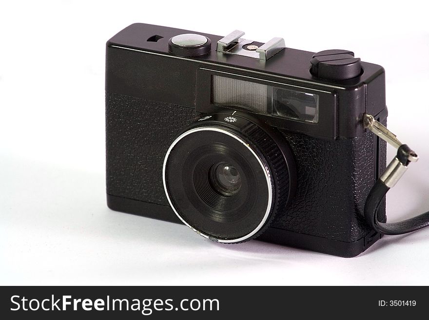 And Old Camera in a white background. And Old Camera in a white background
