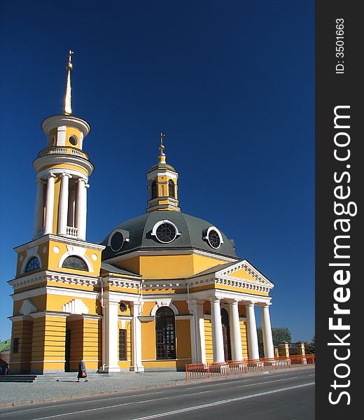 Beautyfull yellow church on a background of the dark blue sky