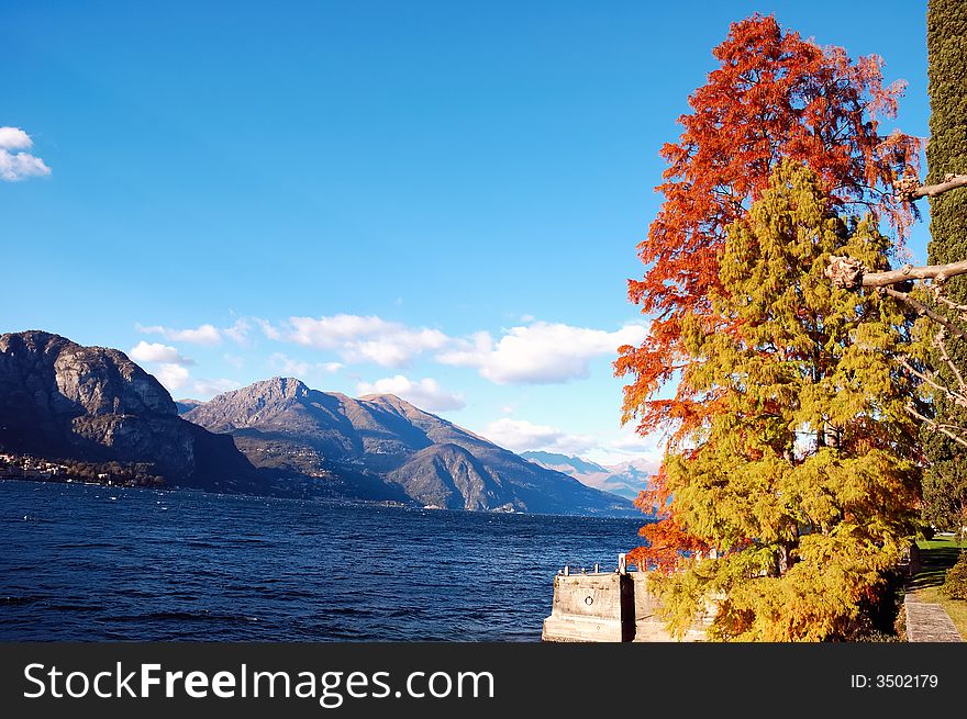 Lake landscape in fall season, Como Lake, Italy. Lake landscape in fall season, Como Lake, Italy