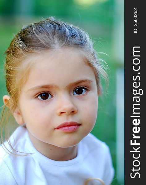 Beautiful young girl with face expression, vertical portrat. Beautiful young girl with face expression, vertical portrat