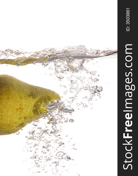 A pear falling in water. A pear falling in water