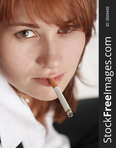 Businesswoman With Cigarette