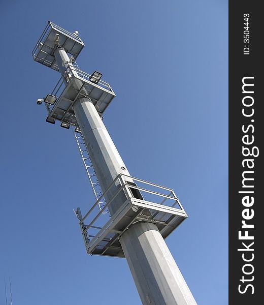 Portual control tower with blue sky