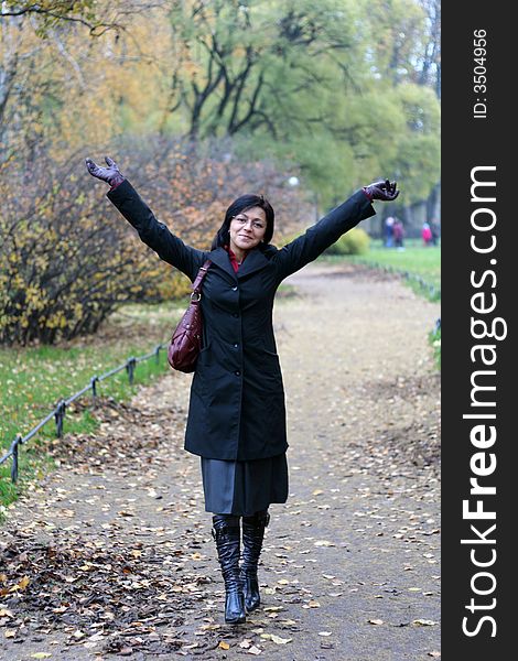 Young Woman In A Autumn Park