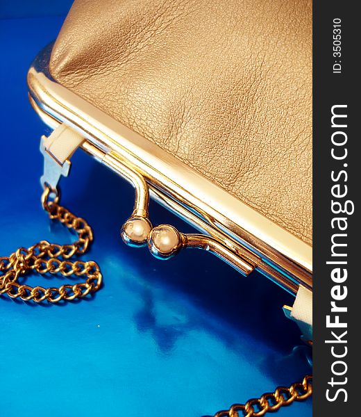 Golden womanish handbag