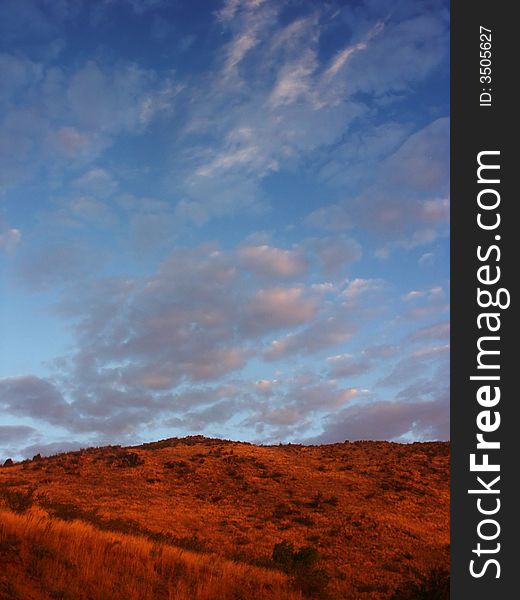 Colorado hills at sunrise with clouds and sky. Colorado hills at sunrise with clouds and sky