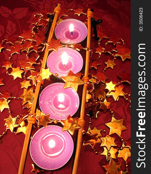 Row Of Pink Candles With Stars