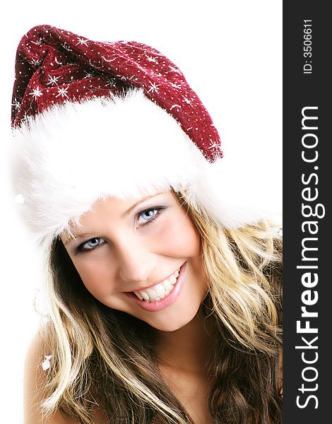 Winter portrait of a beautiful young woman with a cap against white background. Winter portrait of a beautiful young woman with a cap against white background
