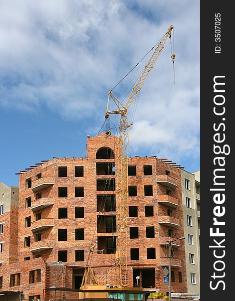 Construction of a multi-storey apartment house. Construction of a multi-storey apartment house.