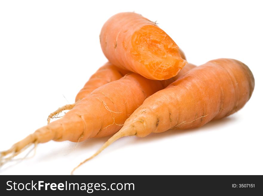 Pile of carrots isolated on white background.