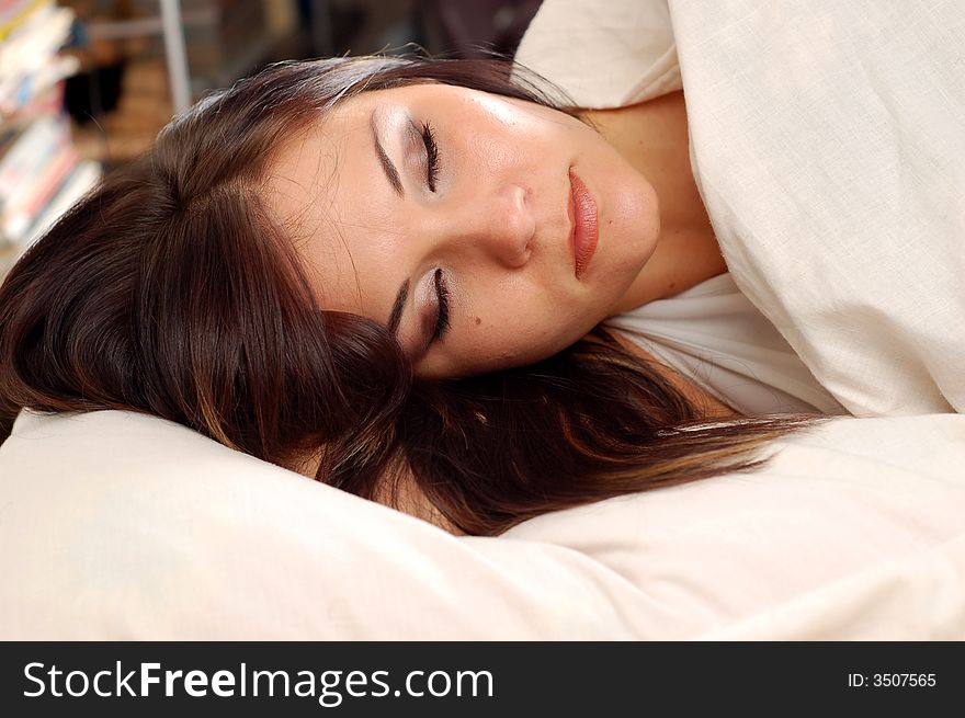 Attractive woman lying on bed. Attractive woman lying on bed