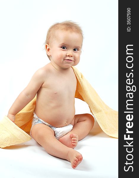 Photo of  happy baby with towel. Photo of  happy baby with towel