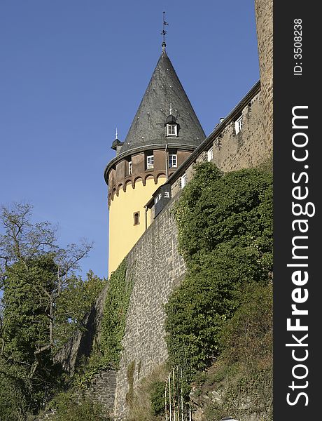 Medieval castle in Germany standing in the bright sunlight of a clear autumn day. Medieval castle in Germany standing in the bright sunlight of a clear autumn day