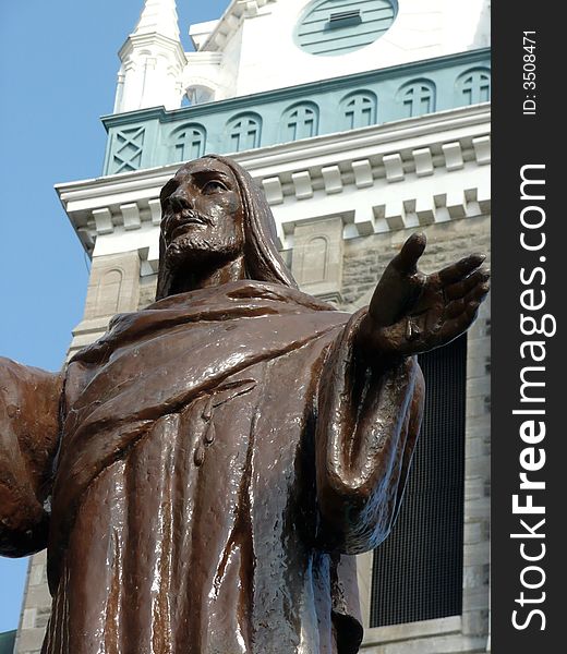 Jesus statue with open arms in front of Catholic church. Jesus statue with open arms in front of Catholic church