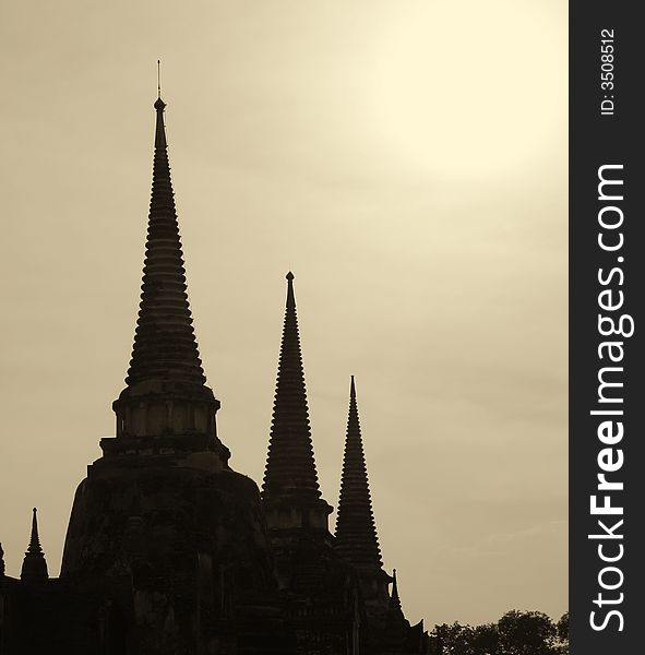 Three towers of the temples of The city Ayutthaya in Thailand. These temples served as the former palace of what now is know as Thailand. Three towers of the temples of The city Ayutthaya in Thailand. These temples served as the former palace of what now is know as Thailand.