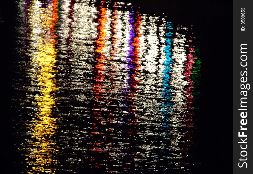 This photo shows a lake at night with many lights. This photo shows a lake at night with many lights.