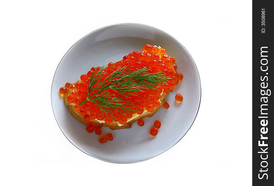 Sandwich with red caviar on a plate