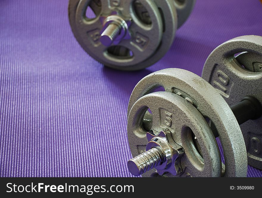 Weights On Yoga Mat