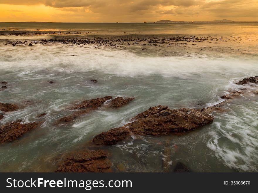 Seascape and wave at dawn in South Africa