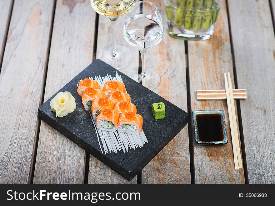 Roll set served on a plate on a table in a restaurant