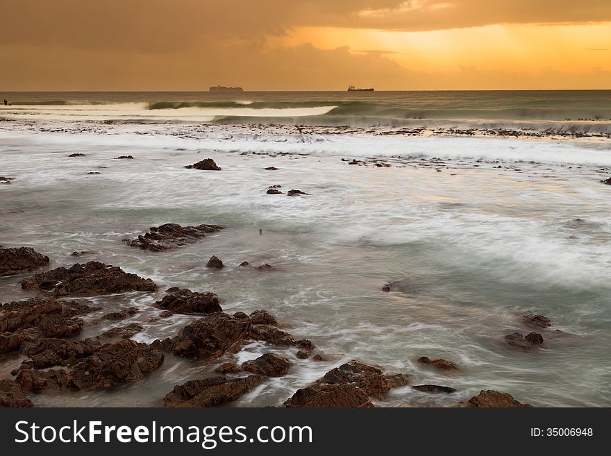 Seascape and wave at dawn in South Africa