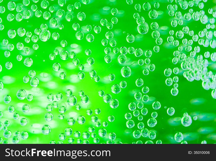 A lot of green drops, abstract background